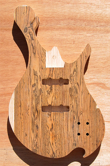 Custom bass body with bocote top, Xylem scroll