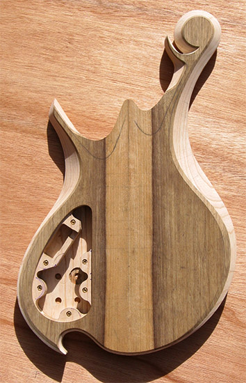 Black limba and ash bass body with body bevel