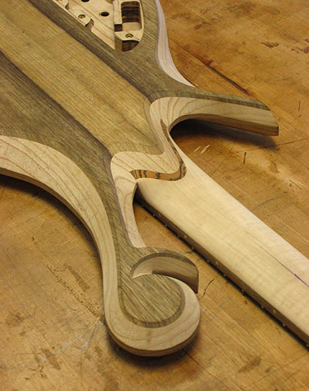 Xylem style scroll on back of a custom bass