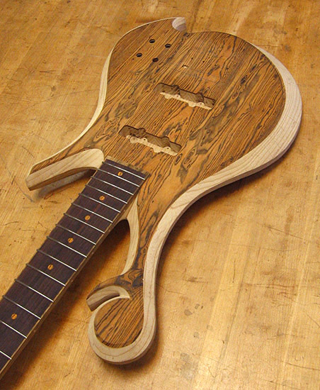 Xylem scroll on a custom four string Jazz style bass