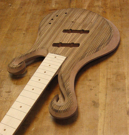 Custom bass with double scrolls, maple fretboard