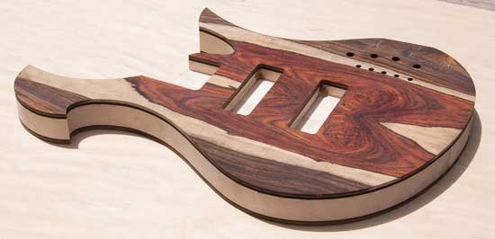 Custom bass with maple body, cocobolo, ebony tops
