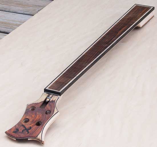Custom bass neck with cocobolo fretboard, ebony/maple binding