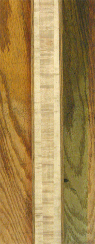 Three piece quartersawn birdseye maple neck of the 5 string custom bass with bocote stringers