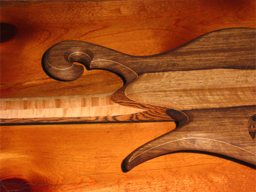 Back of the custom bass black limba body and bird's eye maple neck with bocote accents
