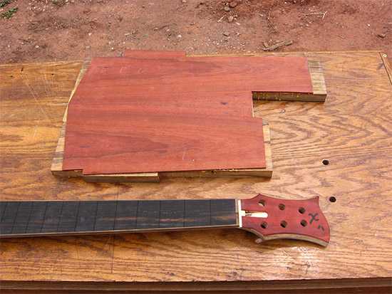 6 string bass neck and body with limba core and bloodwood accent