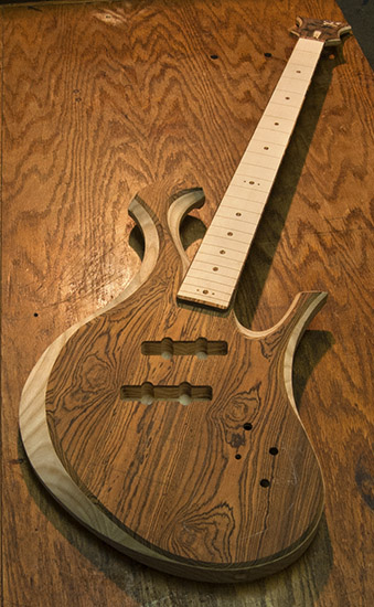 Bocote custom bass guitar with maple fretboard, short scale