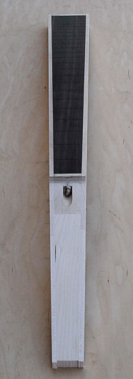 Truss rod adjustment nut on a 6-string bass neck blank