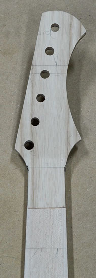 Reverse-inline headstock of a six-string bass
