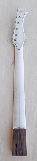 Carved profile of a 6-string Xylem bass neck