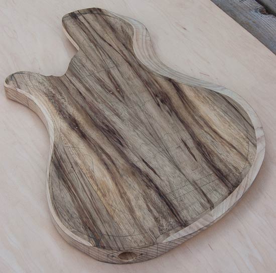 Body bevel of an ash/limba custom bass