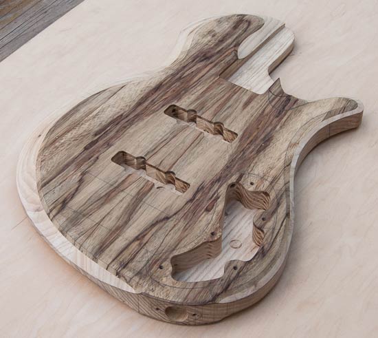 Ash/limba custom bass guitar body, single-cutaway