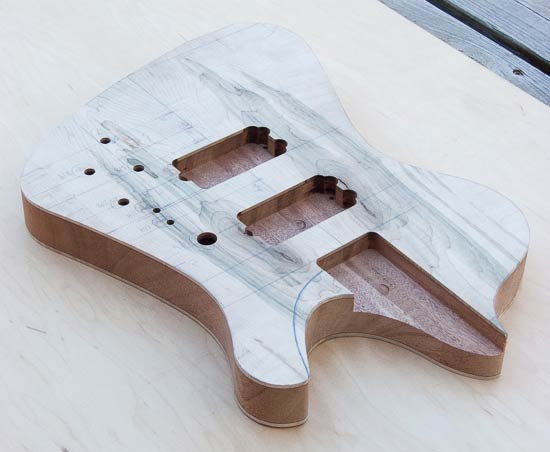 Bass guitar body routed for two humbuckers