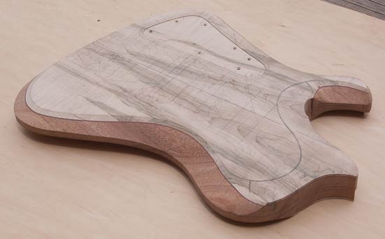 Body carve of a custom bass with Thunderbird shape