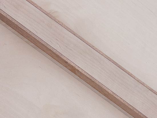 Bass neck before carving, made of maple, mahogany w/ purpleheart stringers