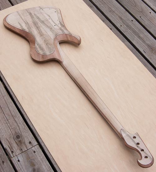 Custom bass with reverse-inline headstock, made of mahogany and maple