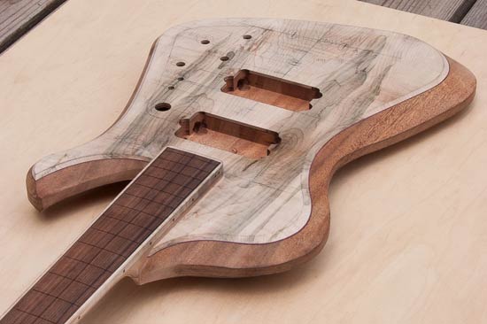 Custom bass guitar made of maple, mahogany and pau ferro