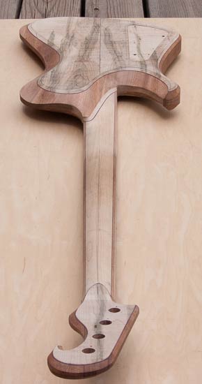 Neck heel of a Thunderbird-style bass guitar