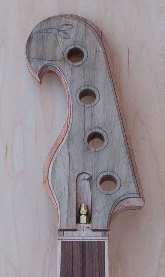 Reverse-inline headstock of a custom bass guitar
