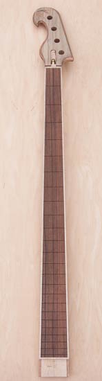 Custom bass neck made of maple, mahogany and pau ferro