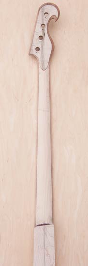 Electric bass guitar neck made of maple with mahogany/purpleheart stringers
