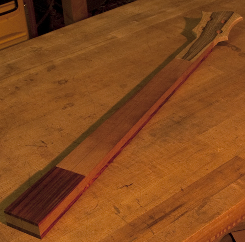 Cocobolo neck shim of a custom bass