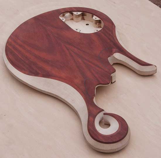 Custom scroll on a bass guitar body