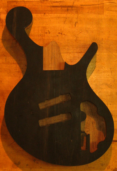Ebony top of a Xylem 5 string custom bass