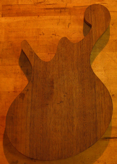 Black walnut top on back of a Xylem bass