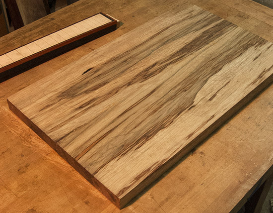 Black limba custom bass body with maple neck