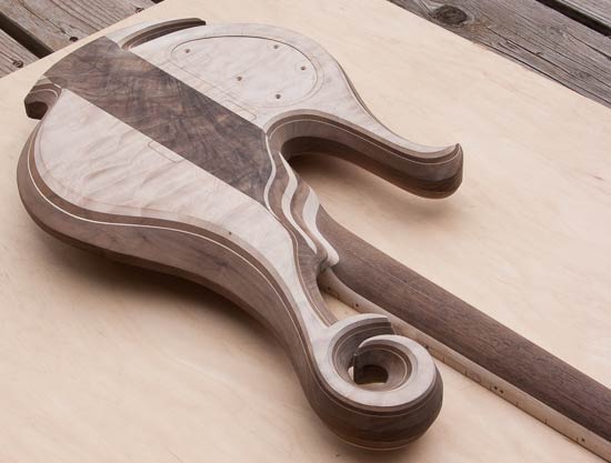 Short-scale bass with deep cutaway to access high frets