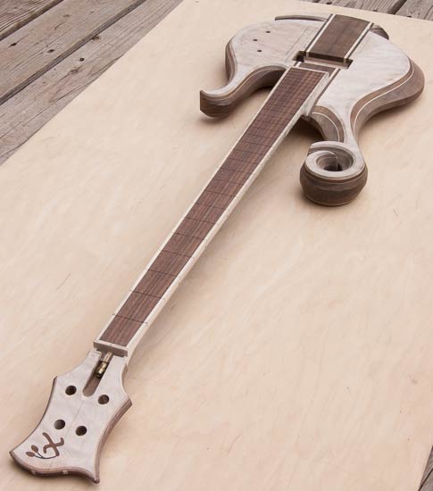 Exotic electric bass made of maple, walnut and pau ferro