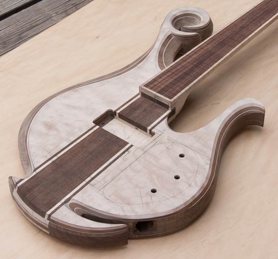 Quilted maple tops with walnut laminates on a custom bass guitar