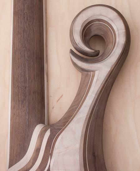 Hook scroll on a custom bass made of maple and walnut