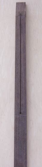 Peruvian walnut neck blank for a neck-thru bass guitar, with truss rod channel