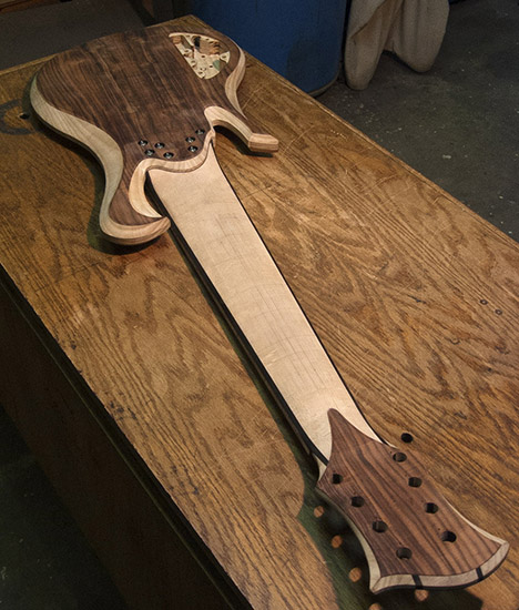 8-string custom bass with maple neck, rosewood tops, back