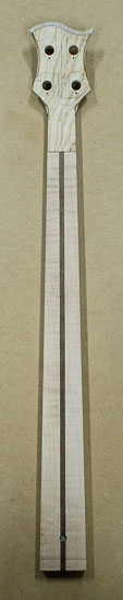 Custom bass guitar neck with maple neck heel, Peruvian walnut core