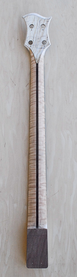 Flamed maple bass guitar neck with Peruvian walnut skunk stripe