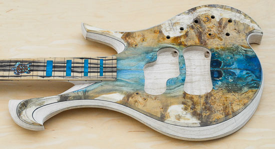 Acrylic stabilized topwood on a custom swamp ash bass body