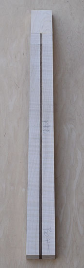 Four-string bass headstock with bloodwood cap