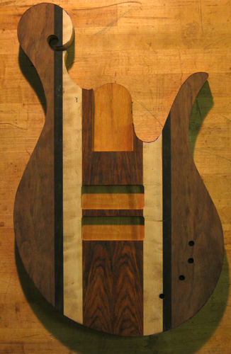 Xylem custom bass body's front right after cutting the body shape out of the blank