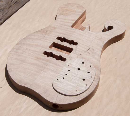 Exotic custom bass body with maple tops, mahogany core