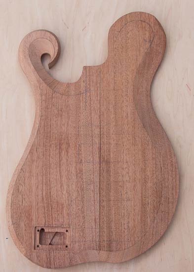 Single-cutway custom bass body, hand-carved