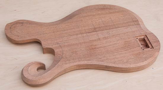 Hook scroll on a flamed maple custom bass