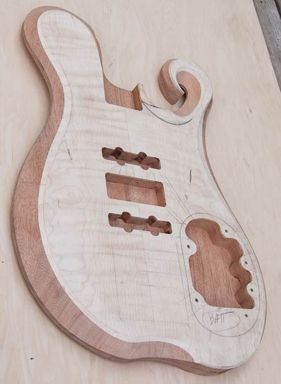 Exotic custom bass body, mahogany/flamed maple 