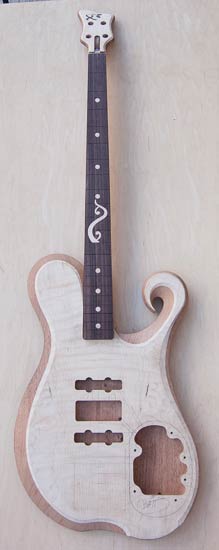 Bass guitar w/ custom inlay, three pickups