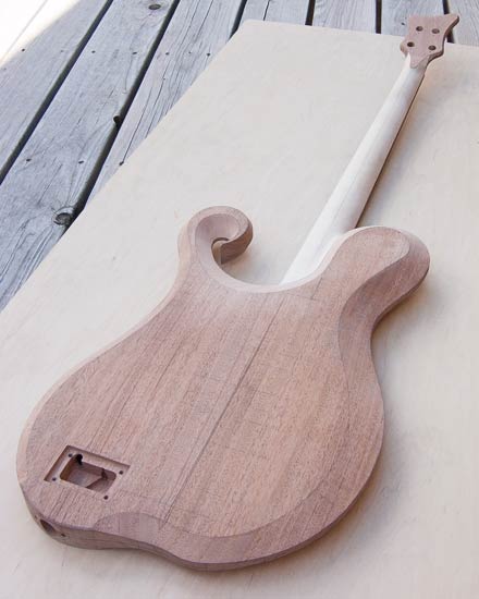 Custom bass body, flamed maple top, mahogany core