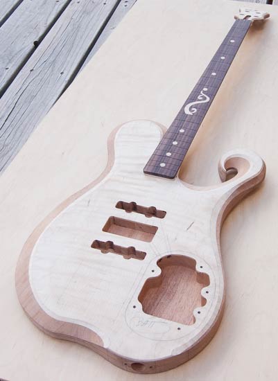 Long-scale bass guitar w/ custom inlay