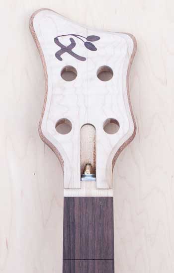 Maple/mahogany headstock with rosewood inlay