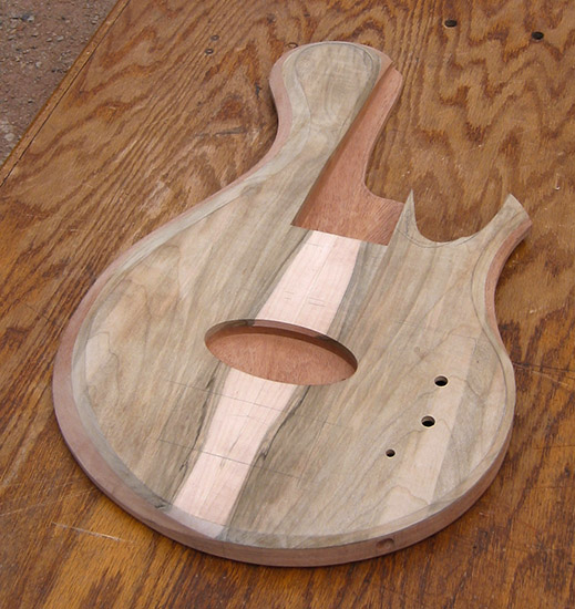 5 string custom bass with carved bevels
